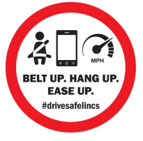 Car freshener shows the images of a car seat belt, a mobile phone and the miles per hour gauge. Text reads: belt up, hand up, ease up.